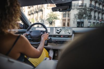 The IONIQ 5 Interior with a woman driving