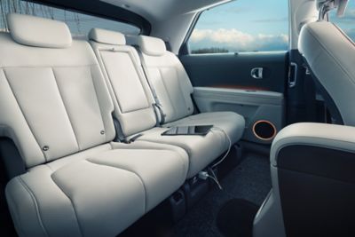 The power sliding rear seats inside of the Hyundai IONIQ 5 electric midsize CUV.