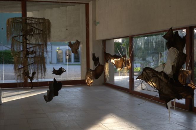 Foreground: Máret Ánne Sara, 'Gutted – Gávogálši', (2022). Background: Máret Ánne Sara, 'Ale suova sielu sáiget', (2022). Exhibition view: ‘The Sámi Pavilion’, 59th International Art Exhibition – La Biennale di Venezia, 'The Milk of Dreams', Venice (23 April–27 November 2022). Photo: Michael Miller / OCA.