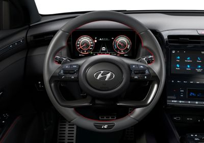 Detail of the Hyundai TUCSON Plug in Hybrid N Line leather steering wheel