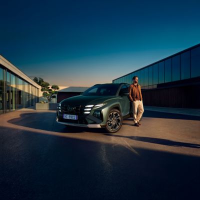 Hyundai Concept THREE on a moon-like surface under a starry sky, featuring a sleek design.