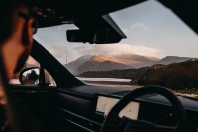  The Hyundai Santa Fe's cockpit with the Panoramic curved display with two 12.3" screens.