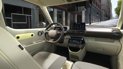 The compact centre console and the spacious cockpit of the new Hyundai INSTER small electric car.