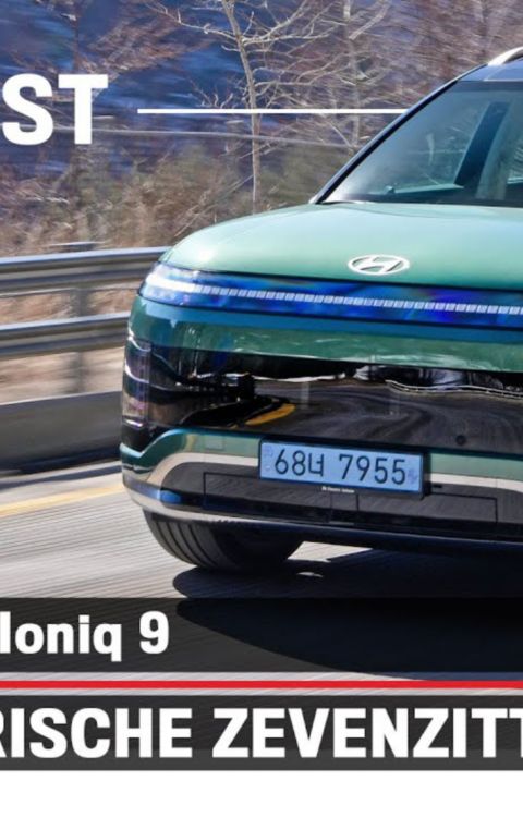 Red Hyundai IONIQ 3 front detail showing slim LED light strip and N Line badge on sculpted body.