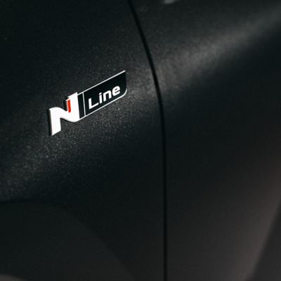 Hyundai TUCSON Hybrid N Line badge.