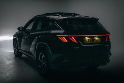 Hyundai TUCSON Hybrid N Line rear studio shot.