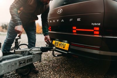 Close up of a trailer being hitched onto a Hyundai SANTA FE.