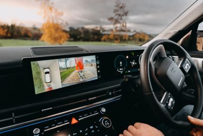 Hyundai SANTA FE rear camera view with tow bar attached.
