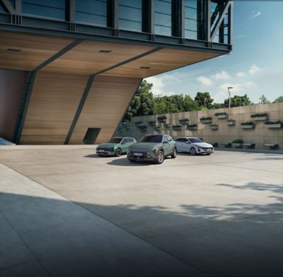 Hyundai Concept THREE on a moon-like surface under a starry sky, featuring a sleek design.