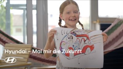 Video mit Kindern, die ihre Vorstellung von der Mobilität der Zukunft malen.