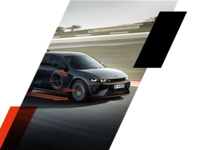 Ein blauer Hyundai i20 N von vorne unter einer Brücke.