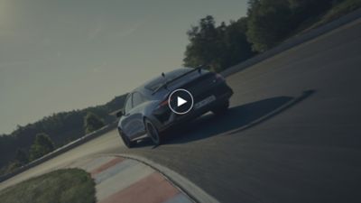 Rear view of Hyundai IONIQ 6 N electric performance sedan racing on track 