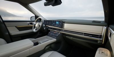 The curved panoramic display with two 12.3" screens inside the Hyundai Santa Fe.	