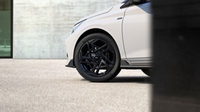 The front wheels on the Hyundai i20 N Line with their stylish two-tone finish.