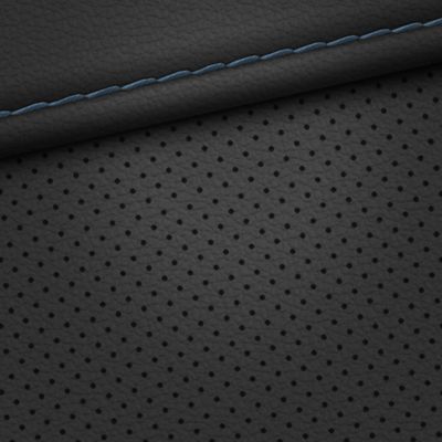 The black textile or leather seats inside the Hyundai TUCSON Plug-in Hybrid compact SUV.