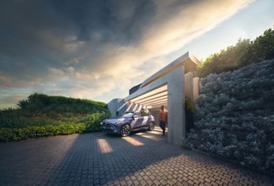 Hyundai KONA Electric podłączony do ładowarki naściennej Hyundai WallBox.