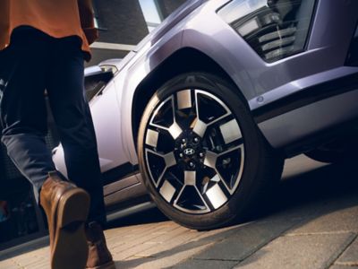 A close up of the alloy wheel of the Hyundai Kona Electric SUV.