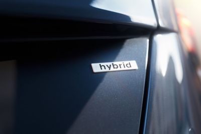 A close-up image Hybrid emblem of the all-new Hyundai KONA. 