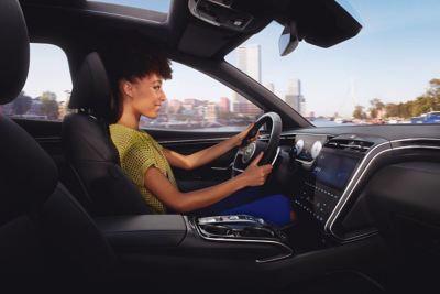 Rear seats of the Hyundai TUCSON Plug-in Hybrid in black.