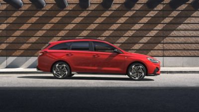 The Hyundai i30 N Line Wagon pictured from the driver side rear.