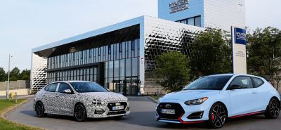 Hyundai European Technical Center, Nürburgring Nordschleife, i20 N & i30 Fastback N parked in front.