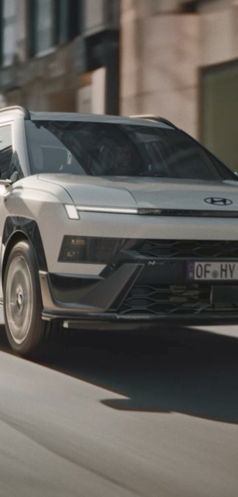 Hyundai BAYON N Line driving on the city street.