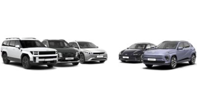 5 Hyundai vehicles parked next to each other:  SANTA FE, TUCSON, IONIQ 5, IONIQ 6 and KONA.