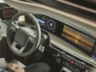 Hyundai interior with digital display and controls.
