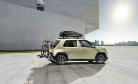 Hyundai INSTER with mounted Bike carrier for all tow bars and Roof box transport accessory.