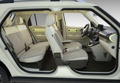 Zijaanzicht van de voor- en achterzetels van de nieuwe compacte, elektrische Hyundai INSTER.