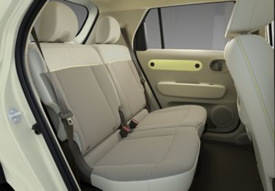 A closeup of the comfortable rear seats of the new Hyundai INSTER small electric car.