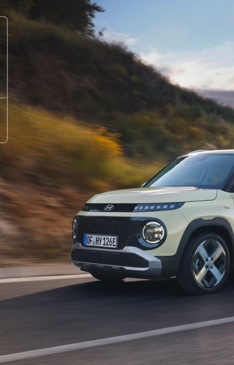 A Hyundai INSTER on a forest road with EURO NCAP animation showing 5-star rating.