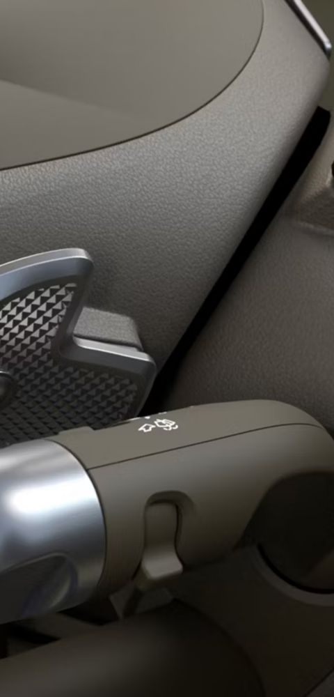 Closeup of the steering wheel mounted paddle shifters on the new Hyundai INSTER small electric car.