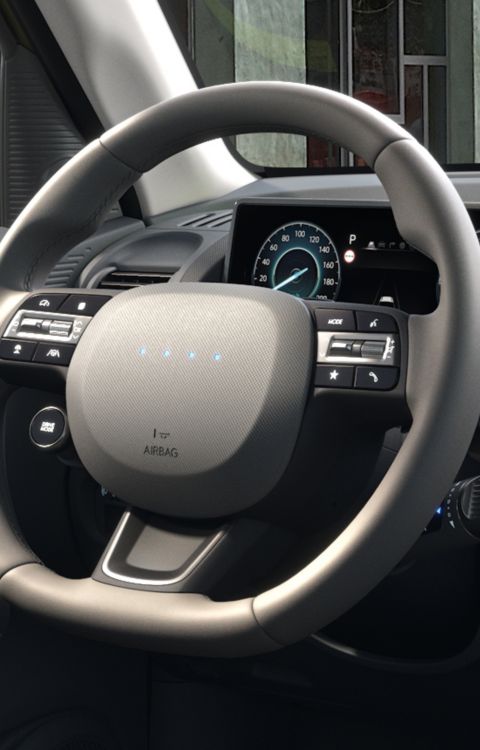 Closeup of the high-end steering wheel of the new Hyundai INSTER small electric car.