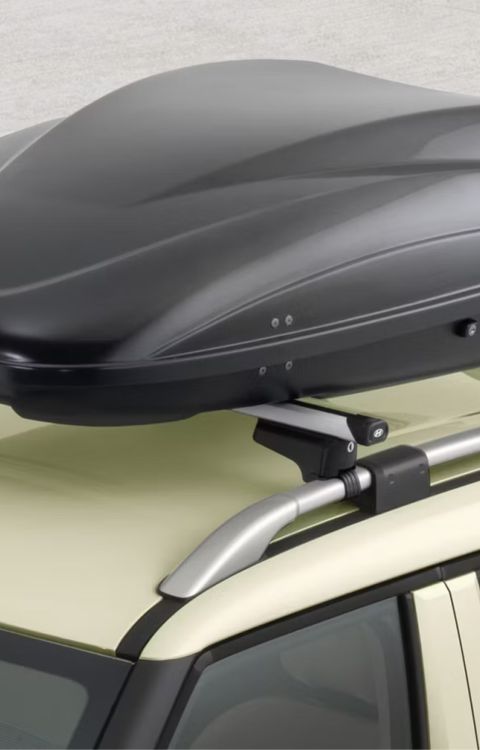 Hyundai INSTER with mounted Roof box transport accessory.