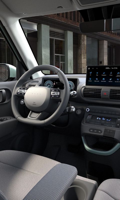 Hyundai Inster Lounge cockpit and front interior.