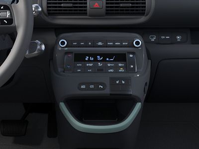 Hyundai INSTER Lounge's centre console with mint green accents.