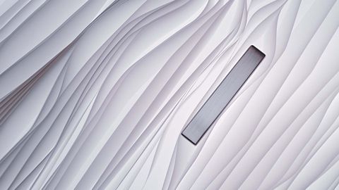 Textured pattern of flowing vertical lines resembling layered fabric.