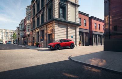 Hyundai KONA Electric driving down the road
