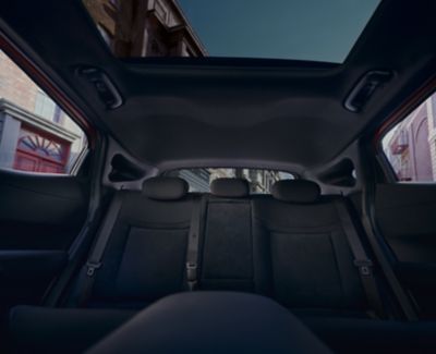 Black rear seats inside the black Hyundai IONIQ 3 N Line interior.
