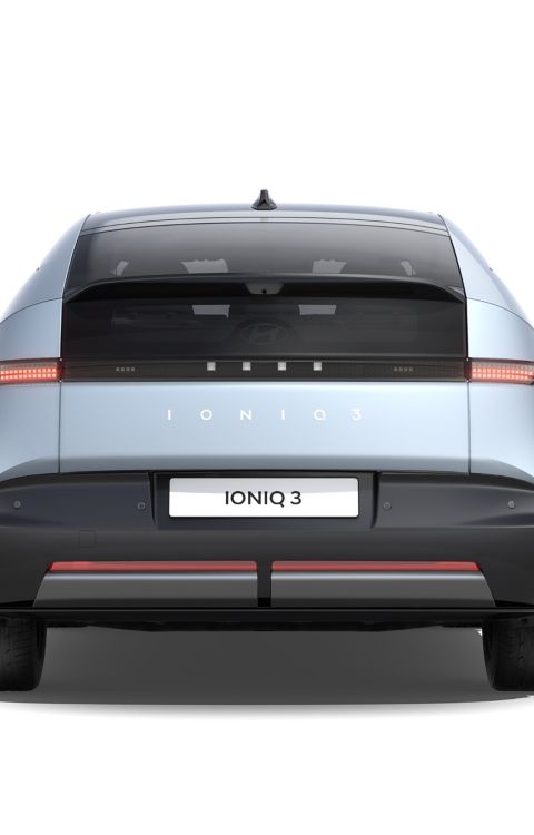 Hyundai IONIQ 3 in Ice Blue Pearl exterior colour pictured from rear.