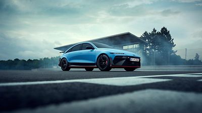 IONIQ 6 N displayed in a dynamic setting, emphasizing its sporty design and performance features.