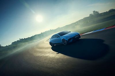 Hyundai IONIQ 6 N high-performance electric sedan show from front and side on a track.