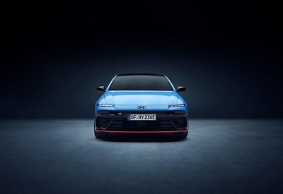 Front view of Hyundai IONIQ 6N showcasing bold grille and distinctive headlight styling.”