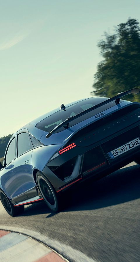 IONIQ 6 N navigating a curve, demonstrating agility with an emphasis on performance.