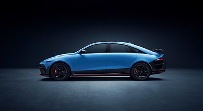 Side profile of Hyundai IONIQ 6N emphasising sleek lines, aerodynamic body and dynamic proportions.