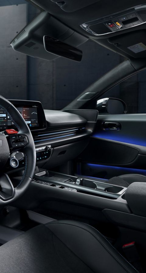 Interior view of the Hyundai IONIQ 6 N showing the cockpit, digital displays, and driver-oriented controls.