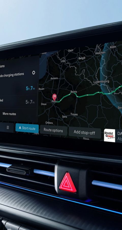 IONIQ 6 N interior display showing navigation map and digital driver information on the wide curved infotainment screen.