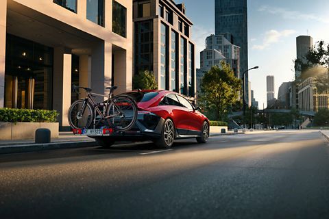 Hyundai IONIQ 6 with mounted bike carrier for all tow bars transport accessory.