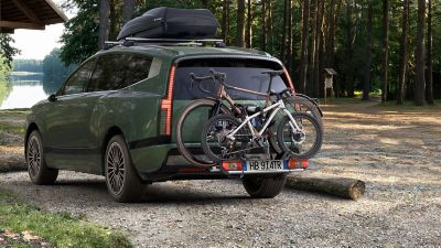 Hyundai IONIQ 9 with mounted Roof box and bike carrier for all tow bars transport accessories.